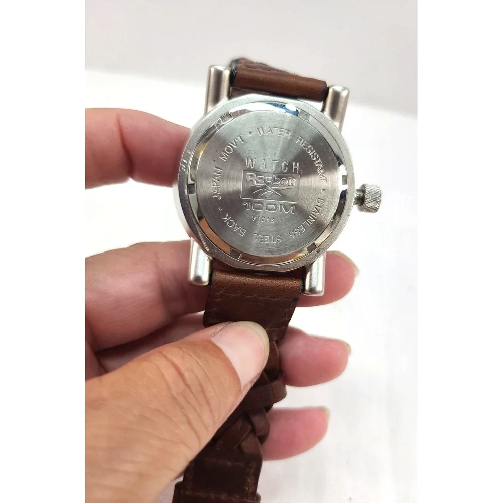 Reebok Sport Men's 100m Silver Round Leather Band Analog Quartz Watch